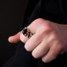 Oz Abstract R455 Spade ring with Garnet on male model.