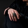 STS R01Sv Silver Skull Ring on male model. 