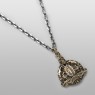Solid Traditional Silver coin skull necklace.