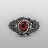 Red eye ring by strange freak designs.