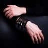 Oz Abstract Tokyo original hand made double buckle wrist band. Black color on male model. 