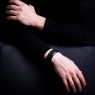 Oz Abstract Tokyo original hand made single stud wrist band. Black color on male model. 
