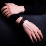 Oz Abstract Tokyo original hand made single stud wrist band. Brown color on male model. 