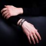 Oz Abstract Tokyo original hand made single stud wrist band. Python skin on male model.