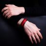 Oz Abstract SS-RD single stud wrist band red on male model.