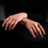 Oz Abstract R591RB Trust Ring on female model.