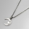 Kalico Lucy Moon necklace with diamonds left view.
