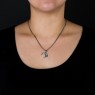 Kalico Lucy Moon necklace with diamonds on female model.