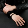Oz Abstract Tokyo Cro-Bz Cross design leather bracelet on male model.