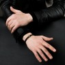 Oz Abstract Tokyo Str-Br Star design leather bracelet on male model.