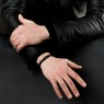 Oz Abstract Tokyo Str-Bz Star design leather bracelet on male model.