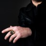 STS R02Br Brass Skull Ring on male model.