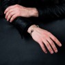 STS BR13 Silver bangle skull design bracelet on male model.