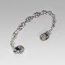 STS BR13 Silver bangle skull design bracelet up right view.