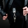 Oz Abstract Tokyo black leather key holder on male model.
