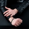 Oz Abstract Tokyo silver skulls Crocodile Hunter bracelet on male model.