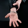 BigBlackMaria X curb silver bracelet on male model.