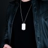 Oz Abstract Tokyo The Misunderstood Dog Tag silver necklace P1901 on male model.