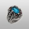 BigBlackMaria Potion ring from silver set with blue topaz and garnet right view.