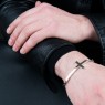 Oz Abstract Tokyo BR262 No Regrets silver cross bracelet on male model.