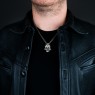 STS Solid Traditional Silver PE10 Skull Pendant on male model.