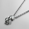 STS Solid Traditional Silver PE11 Skull Pendant left view.