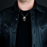 STS Solid Traditional Silver PE11 Skull Pendant on male model.
