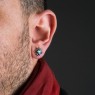 M`s Collection silver pierces with black zirconia on male model. 