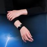 Oz Abstract Tokyo Silk ribbon bracelet with Lightning charm in silver on female model.