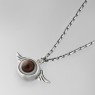 Oz Abstract Tokyo brown eyeball necklace left view.