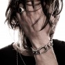 BigBlackMaria X curb silver bracelet on male model.
