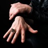 Solid Traditional Silver skull ring STS-R13 on male model.