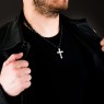 Oz Abstract Tokyo Nite Necklace with onyx and silver cross on male model.