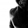 Huge onyx beads necklace by Oz Abstract Tokyo on male model.