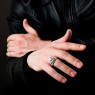 sai011 silver skull ring with zirconia by Saital on male model.