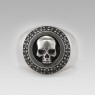 Silver skull ring encrusted with black zirconia front view.