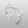 Simple silver bangle X design oz abstract JK2005 up right.