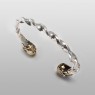 Twisted Silver bracelet with brass skulls by STS.