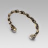 Twisted brass bracelet with silver skulls by STS.