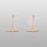 Gold reverse cross pierces.