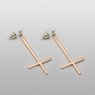 Gold reverse cross pierces.