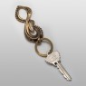 Brass key chain by ability normal.
