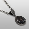MFM black spider necklace.