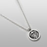 Eagle coin necklace by Saital.