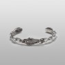 Maria and skull twisted bangle by Solid Traditional Silver.