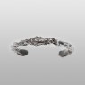 Maria and skull twisted bangle by Solid Traditional Silver.