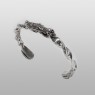 Maria and skull twisted bangle by Solid Traditional Silver.