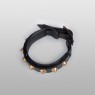 Leather bracelet with brass studs.