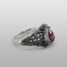 Red eye ring by strange freak designs.